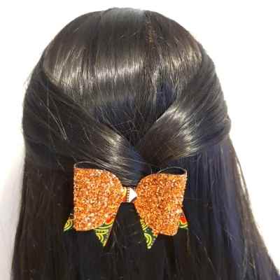 Hair Bow in African Wax Print and Bronze Glitter Fabric