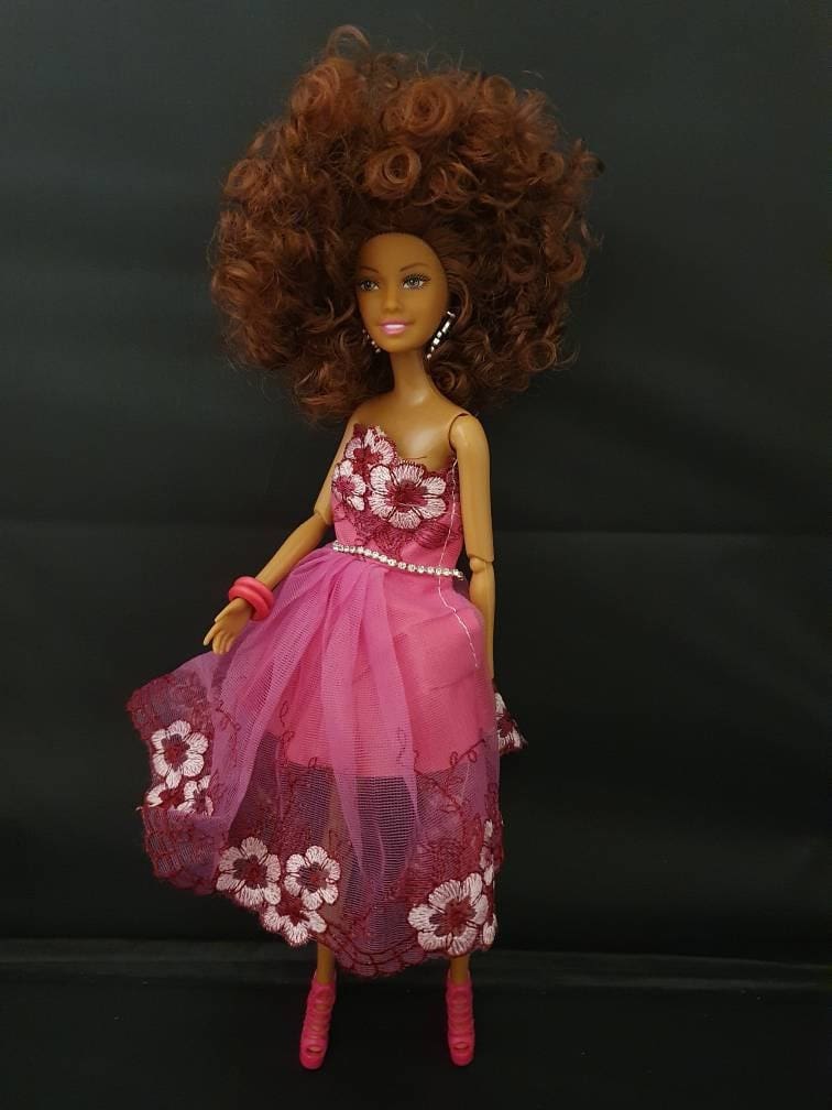 Beautiful Black African Jamaican Mixed Race Ethnic Doll with Brown Skin and Afro Hair wearing a Handmade Dress Pink dress