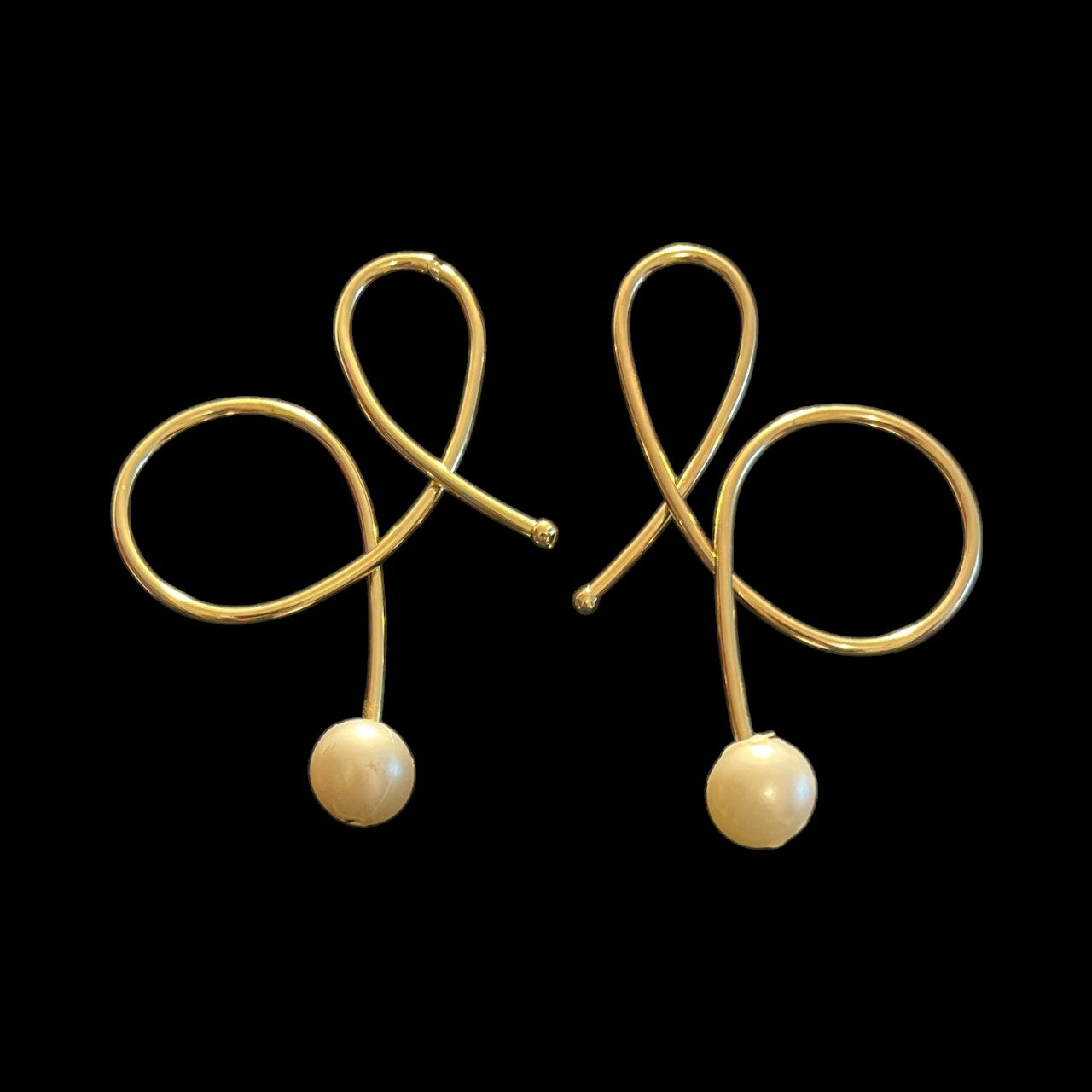 Oshun_Swirls_gold.jpg Oshun_Swirls_gold.jpg